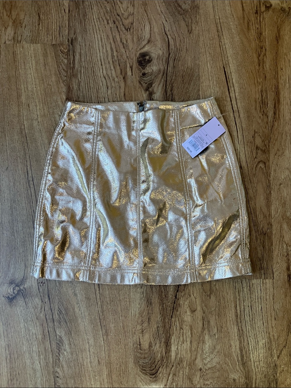 NWT rose gold mini skirt size 4 shiny champagne wild fable